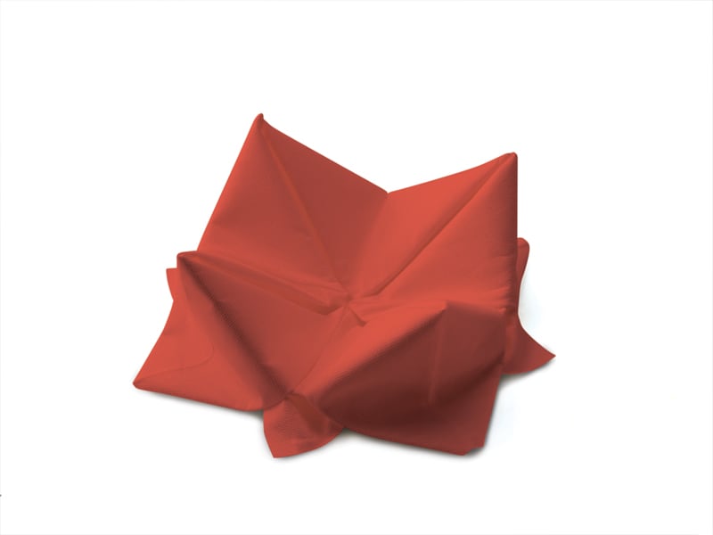 Röd servett Duni 3-lag 33x33cm vikta i en servetthög