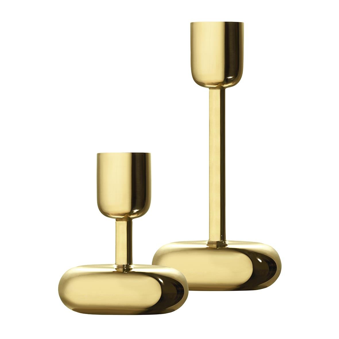 Två mässingsljusstakar i Iittala Nappula design