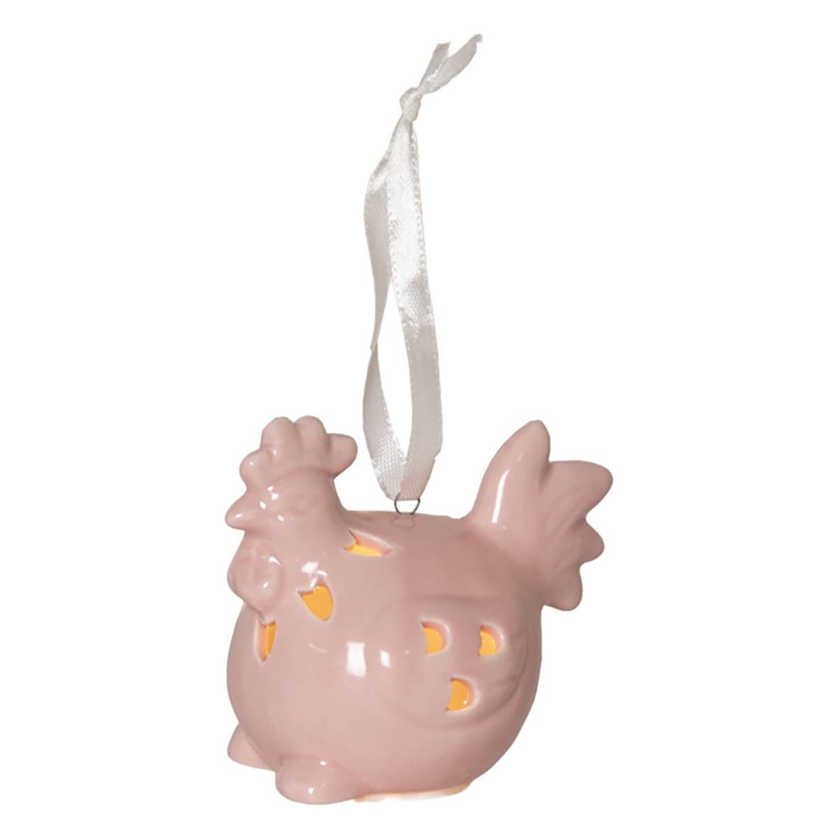Dekorationsfigur av en rosa kyckling med hål och ett vitt band för upphängning