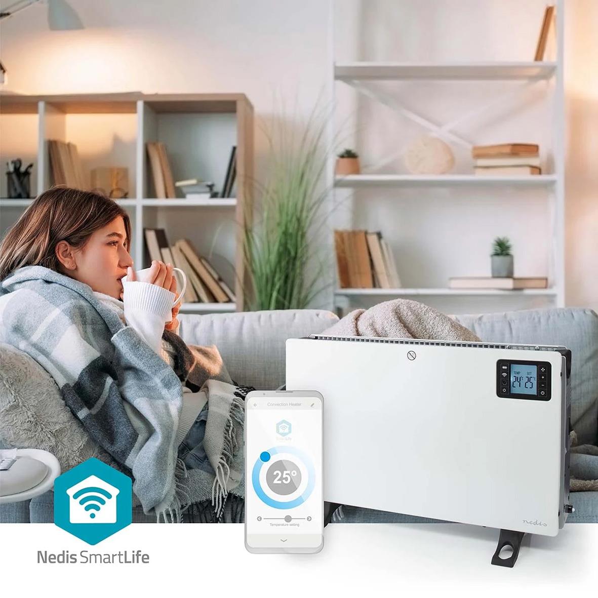 Varmepump eller värmeelement Nedis 2000W Smartlife portabel vit i ett vardagsrum