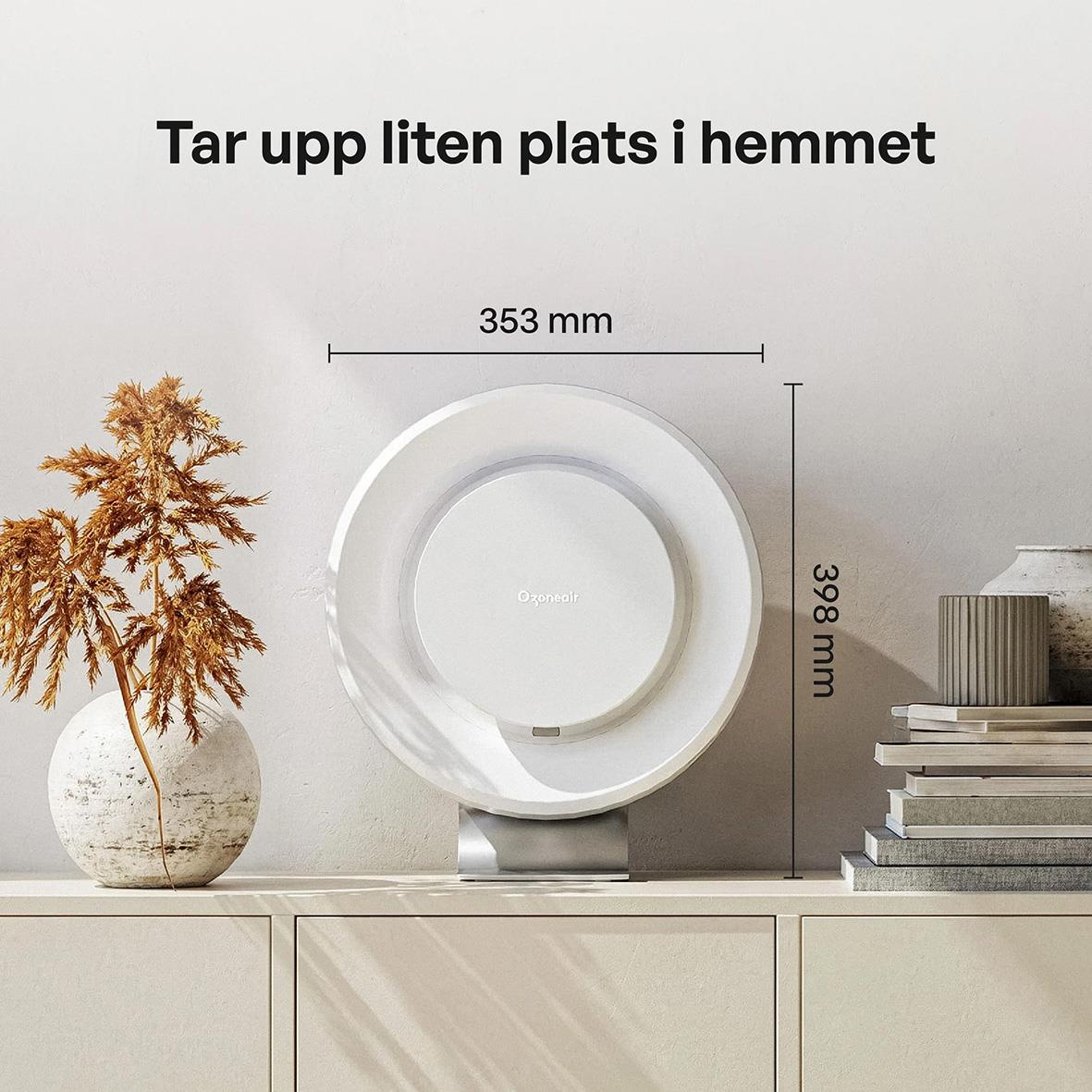 Luftrenare Ozoneair Purify 60 Pro på en vit yta med växt och böcker