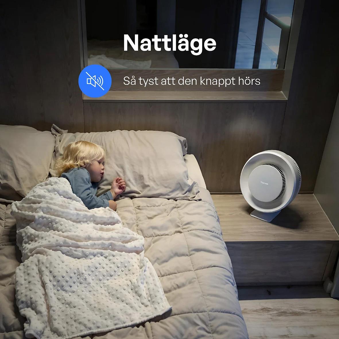 Barn som sover i säng bredvid en luftrenare Ozoneair Purify 60 Pro i ett sovrum