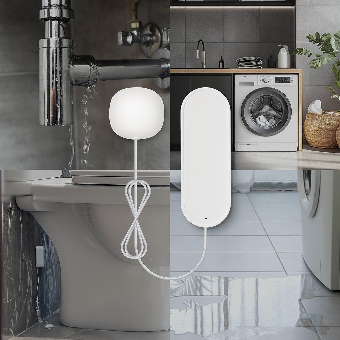 Lampa med sladd hänger över toaletten i ett modernt badrum med tvättmaskin och kök i bakgrunden