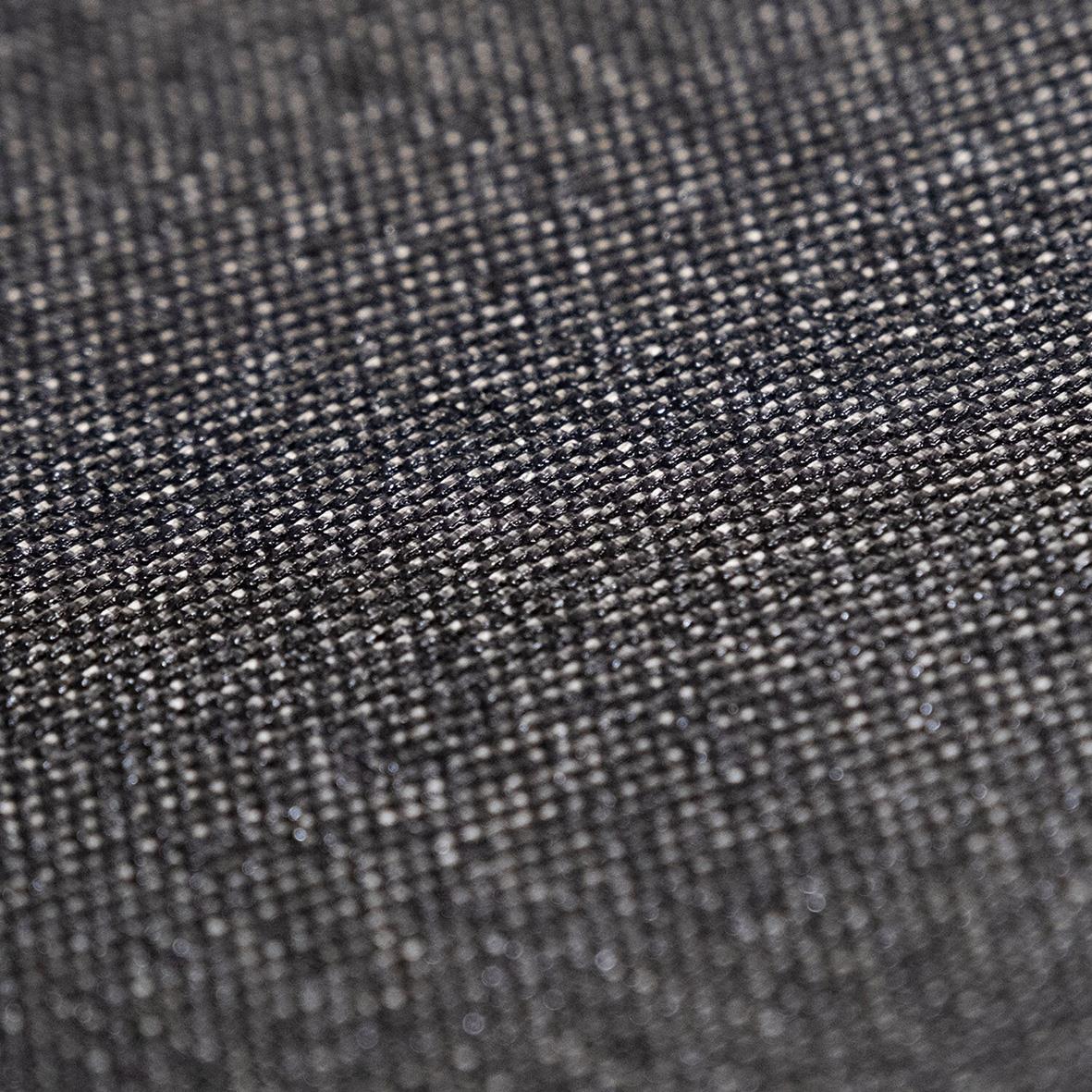 Närbild av svart och grå vävtextur för brandfilt