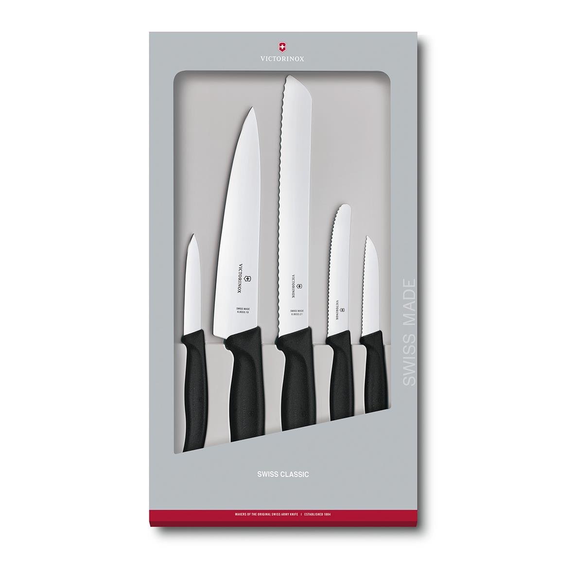 Knivset med fyra knivar i svart handtag och rostfritt stål, förpackad i presentkartong