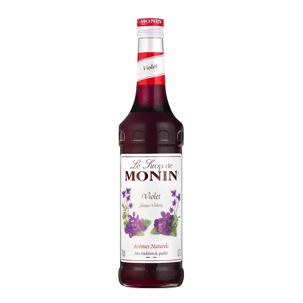 Monin Viol Syrup 70cl flaska med violett färgad vätska och etikett med violblommor