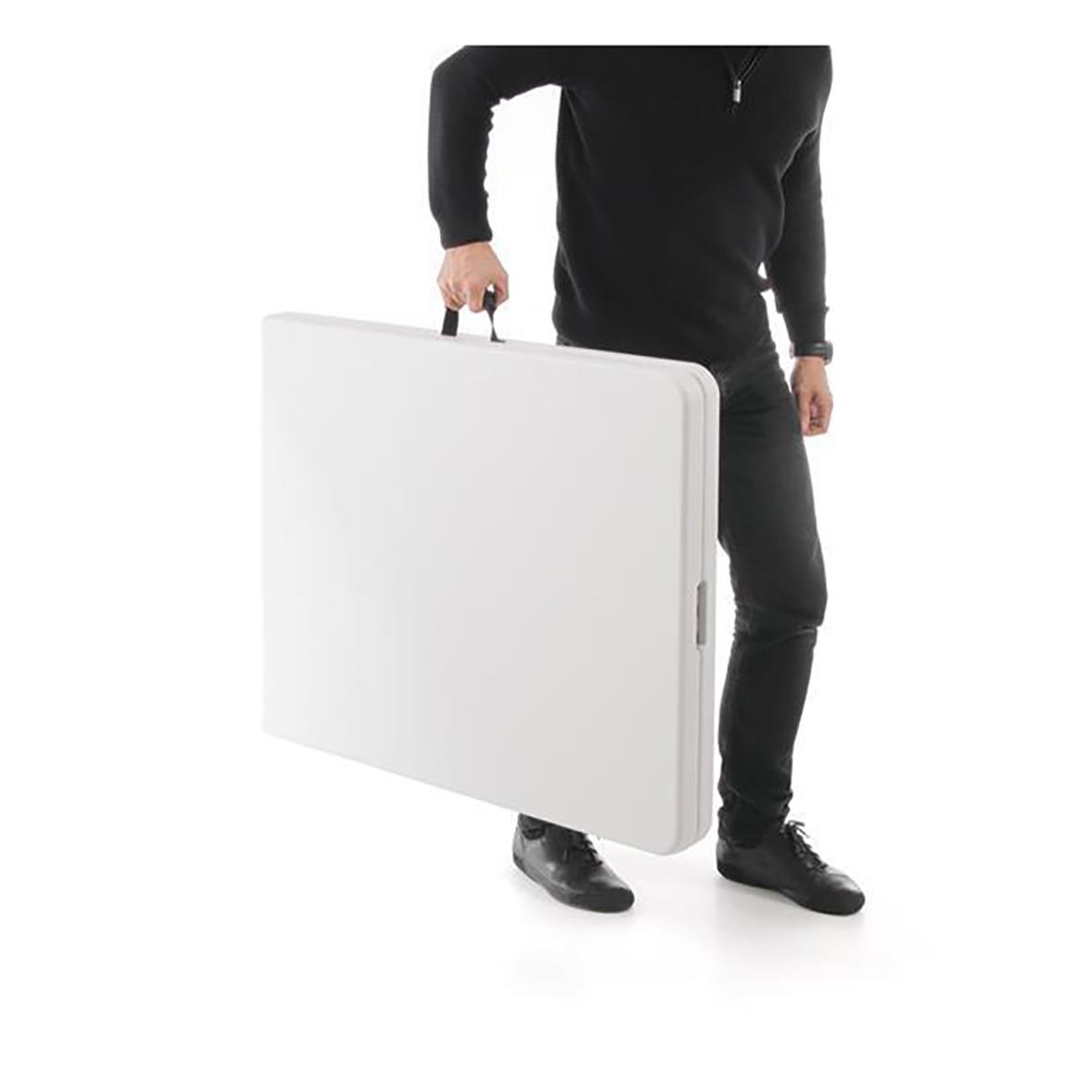 Fällbord Hendi 1520x700x740mm, person håller bord i hand
