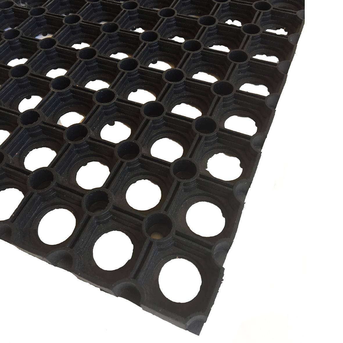 Svart gummimatta med ringmönster och hål för entrébruk, 60x80cm
