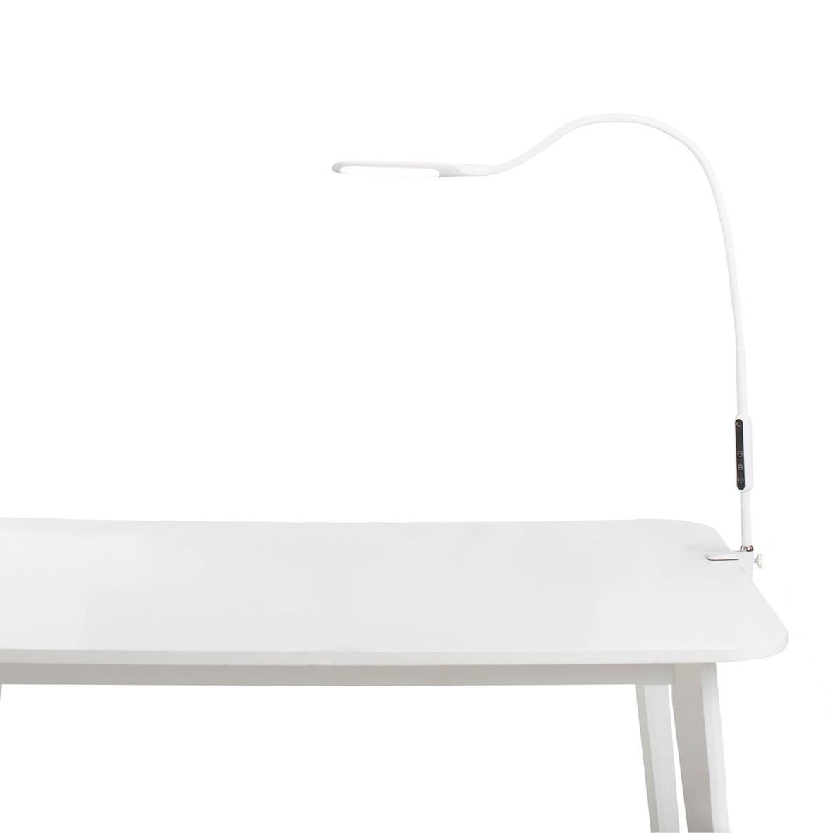 Vit bordslampa Sun-Flex Desklite med böjbar arm på vit bord