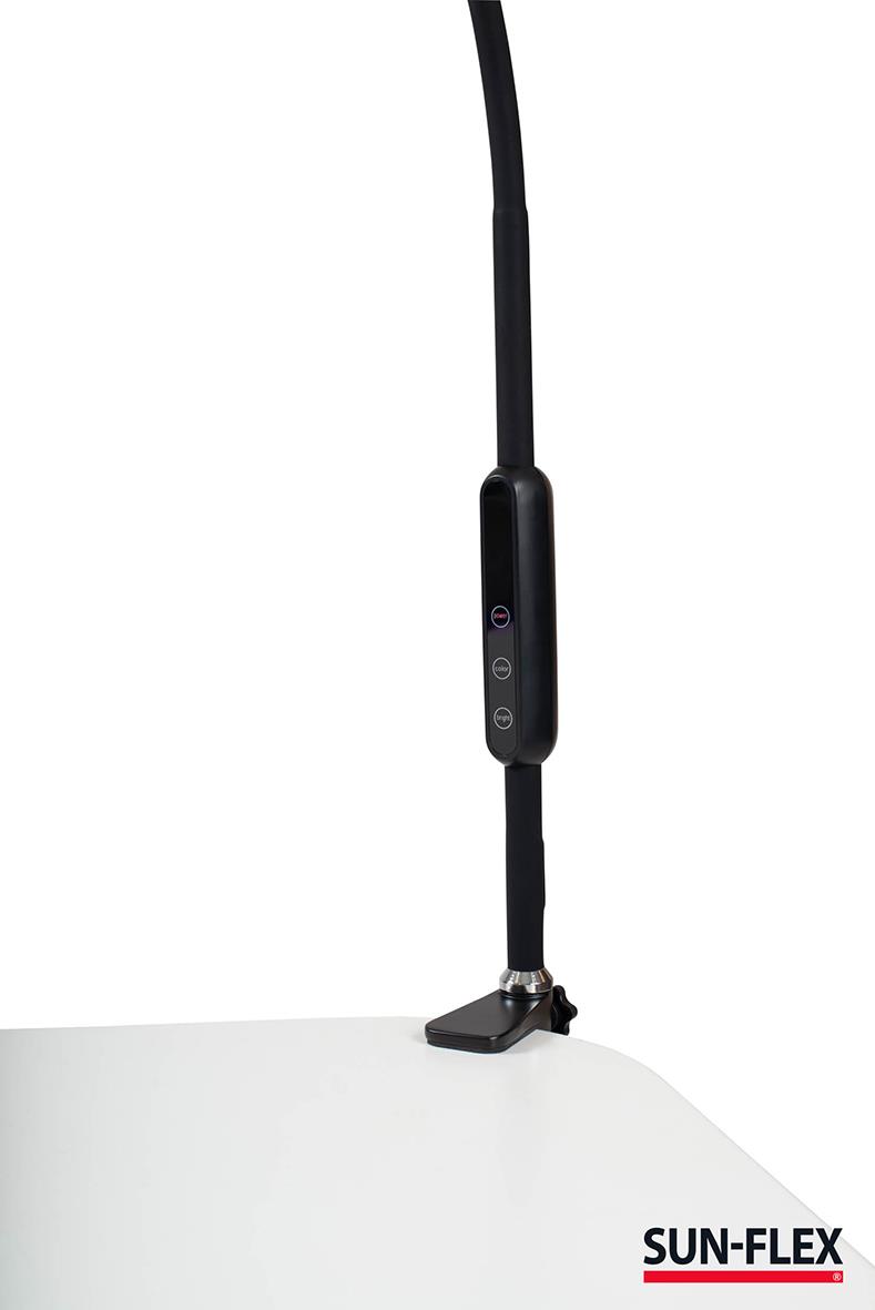 Svart bordslampa Sun-Flex Desklite med justerbar arm och kontrollknappar på bordet