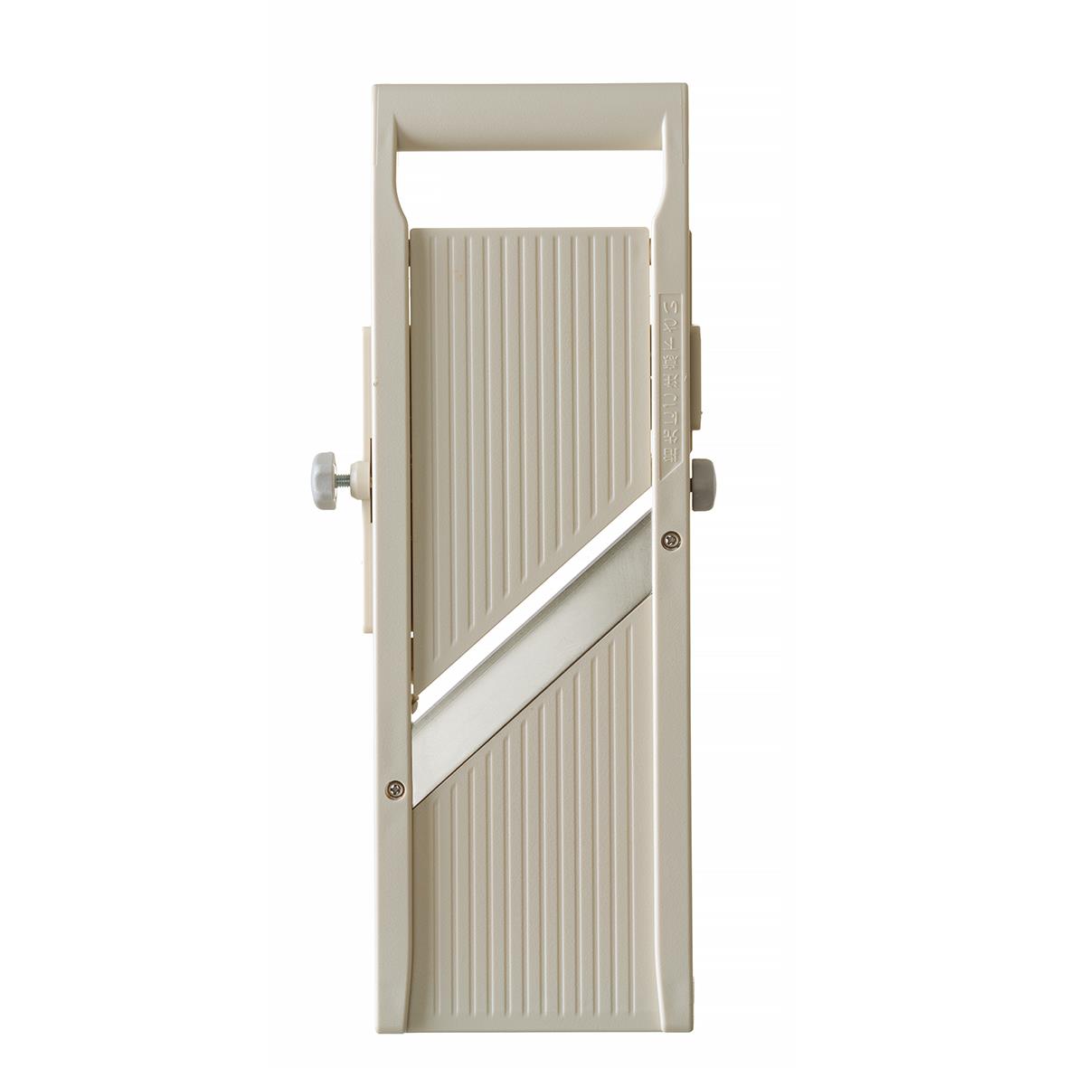 Vit träslagskiva med justerbar handvev och skruvar för att justera höjden