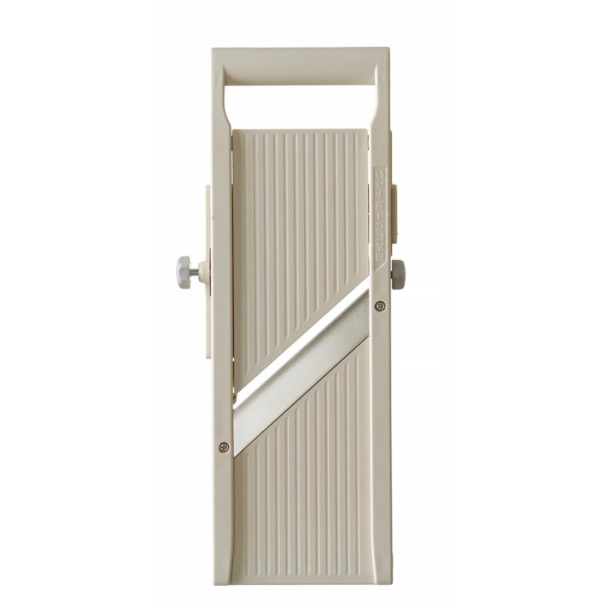 Vit träslagskiva med justerbar handvev och skruvar för att justera höjden