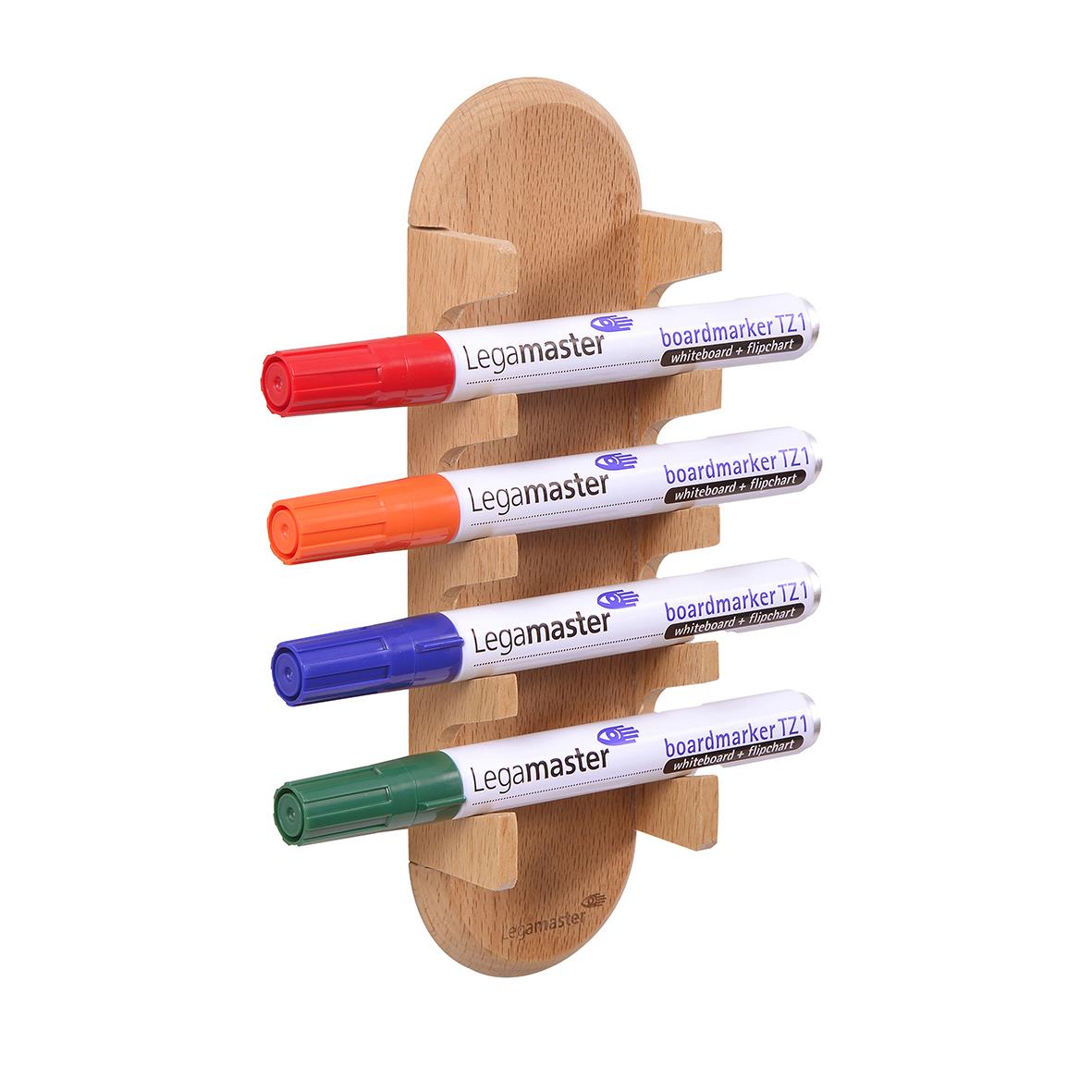 Fyrfärgade whiteboardpennor på en trähållare