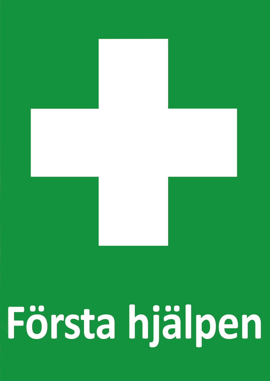 Grön skylt med vit kors och text Första hjälpen