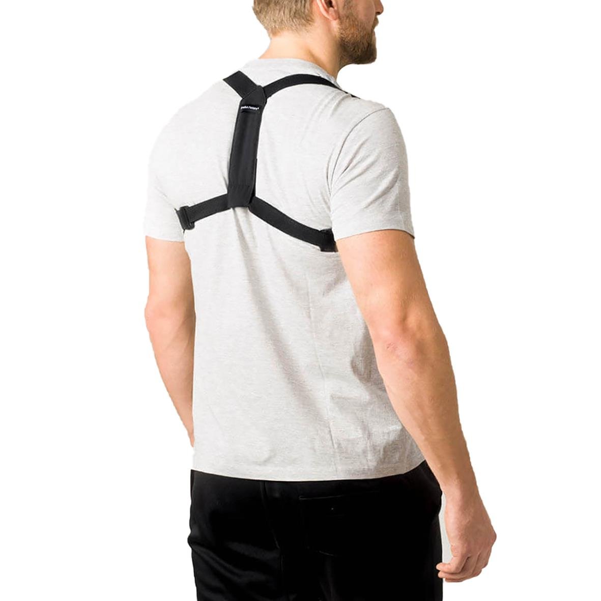 Person bär ett hållningsband på ryggen för bättre hållning, sett bakifrån