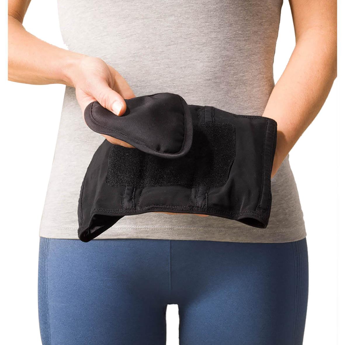 Ländryggsbälte i svart, används för att stödja ryggen, bärs av en person i grått och blått