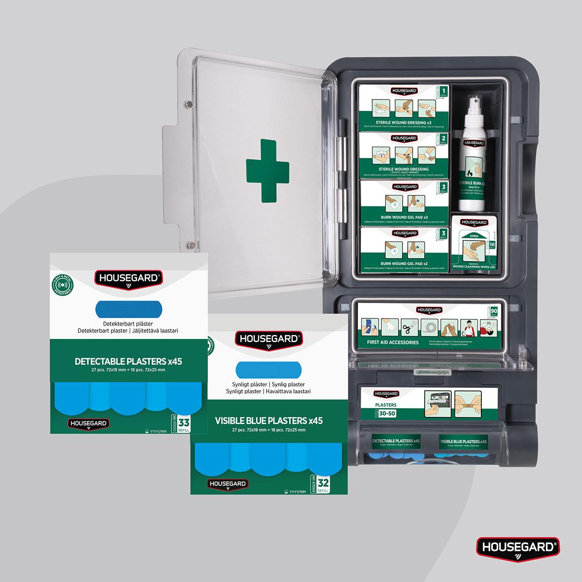 Plåster Housegard synlig refill blå i skåp med grönt kors och olika plåsterprodukter