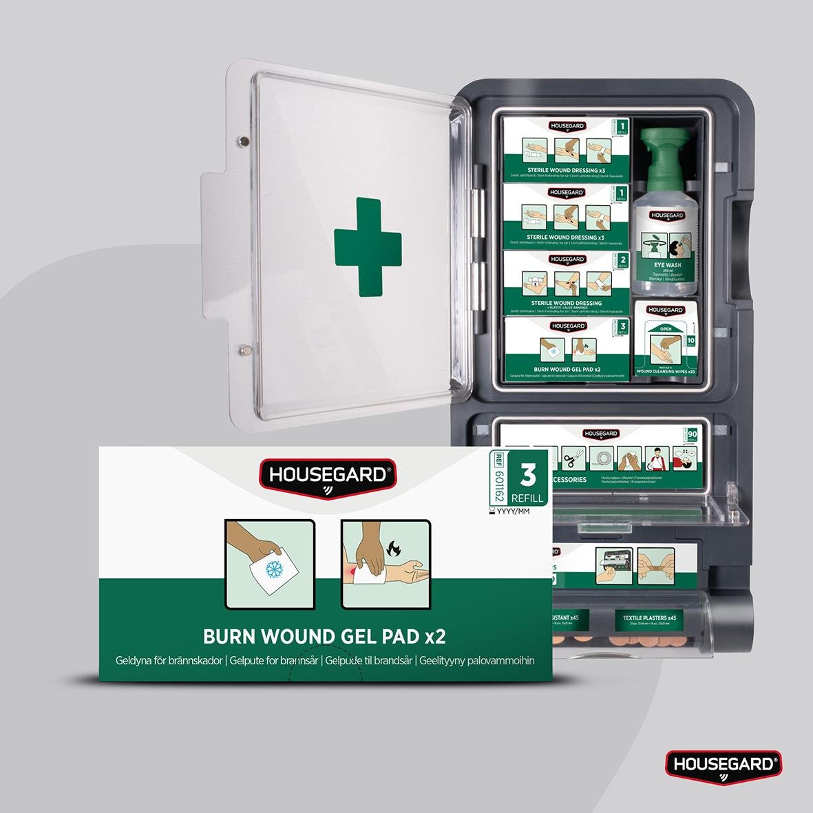 " med brännskadekompress, gelpåsar och förbandsmaterial för första hjälpen"