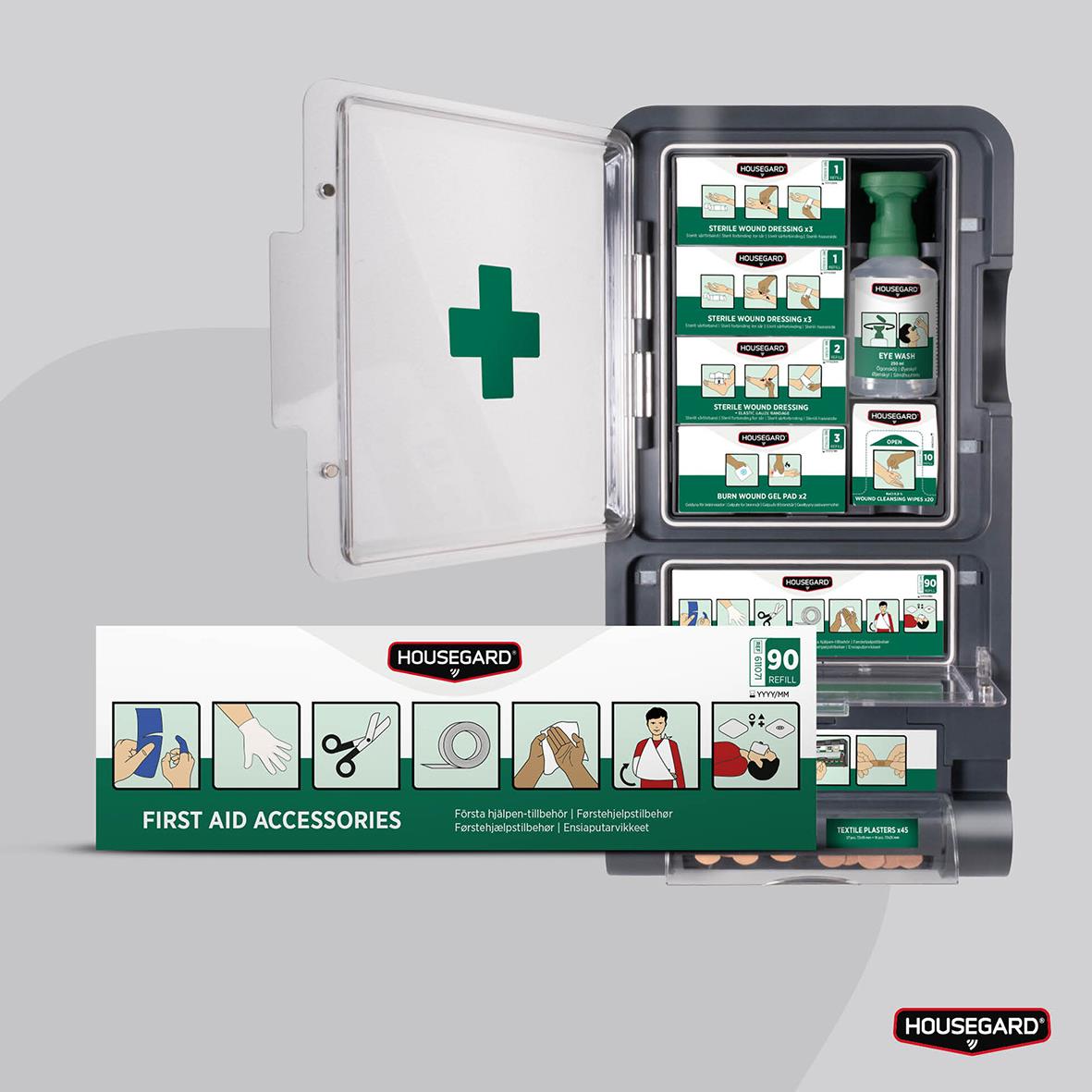 Första hjälpen-skåp med olika förbandsartiklar och tillbehör för nödsituationer