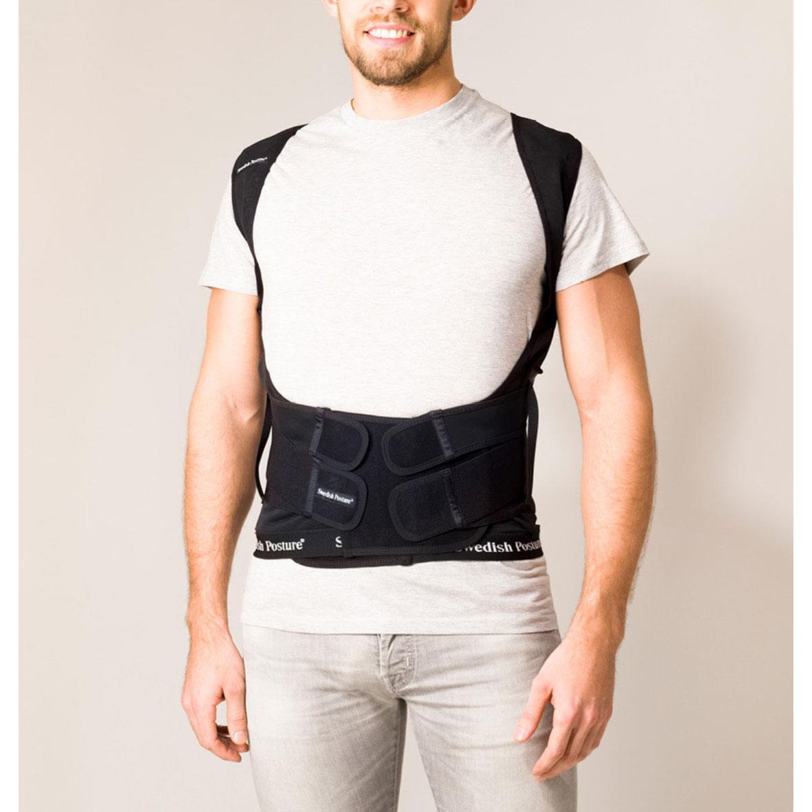 Hållningsväst Swedish Posture Extra Small på en man, svart med justerbara remmar