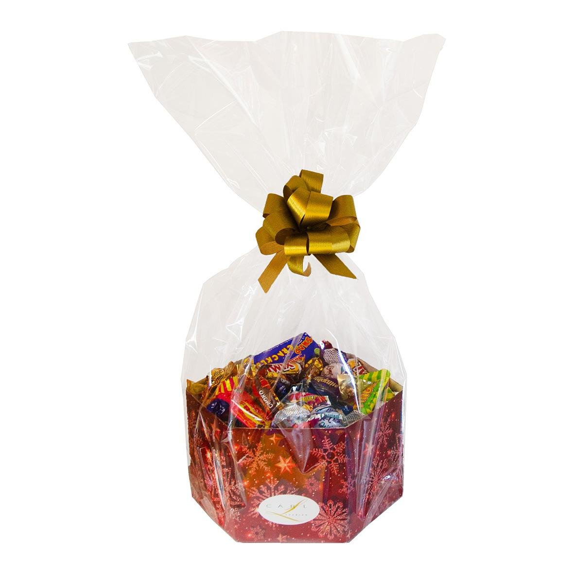 Godis Hexagon 900g i cellofanpåse med guldfärgad rosett