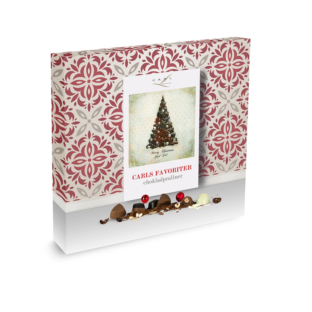 Choklad Carls Favoriter 600g med chokladpraliner och julmotiv på förpackningen