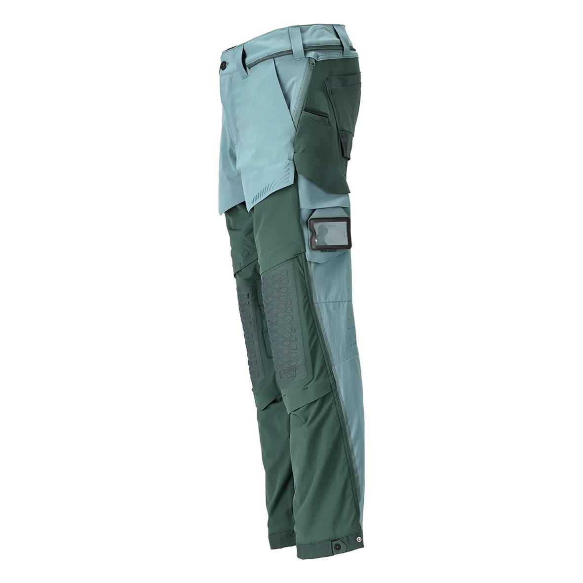 Ljus skogsgrön arbetsbyxa med flera fickor och förstärkningar