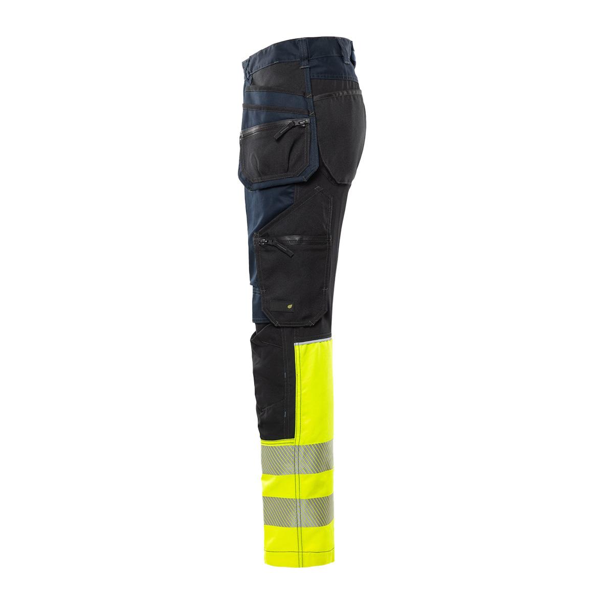 Byxor med fickor och hög synlighetssöm, främst svart med gula reflexband framtill