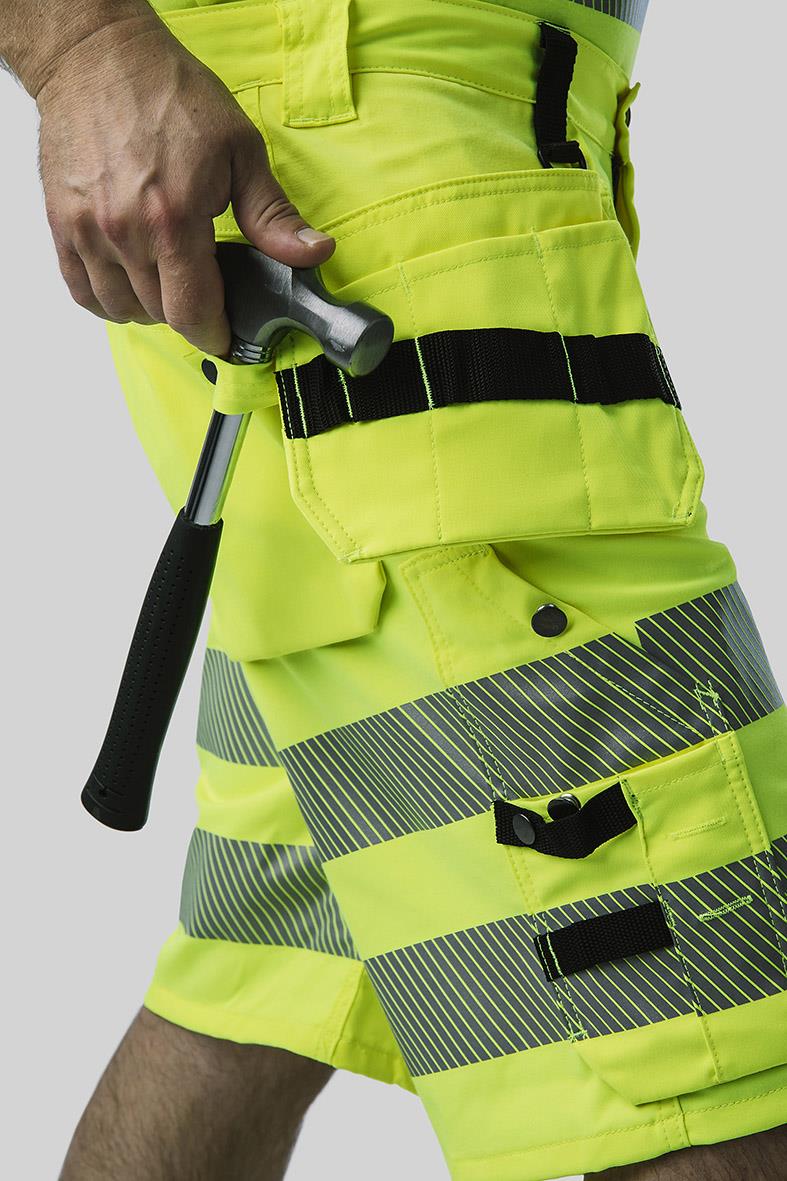 Hantverksshorts i varselgult med reflexdetaljer och verktygsfästen