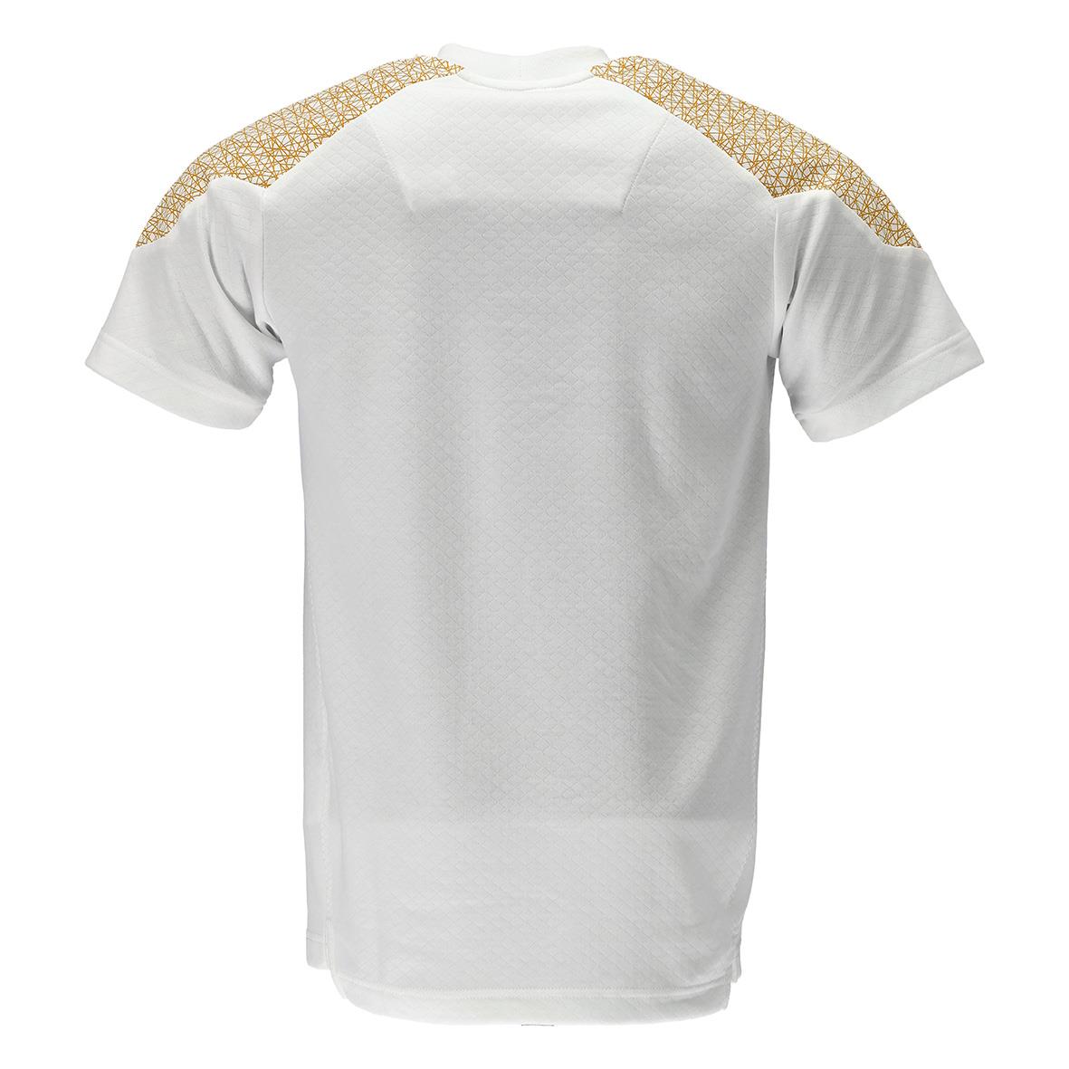 Vit t-shirt med guldglitter på axlarna