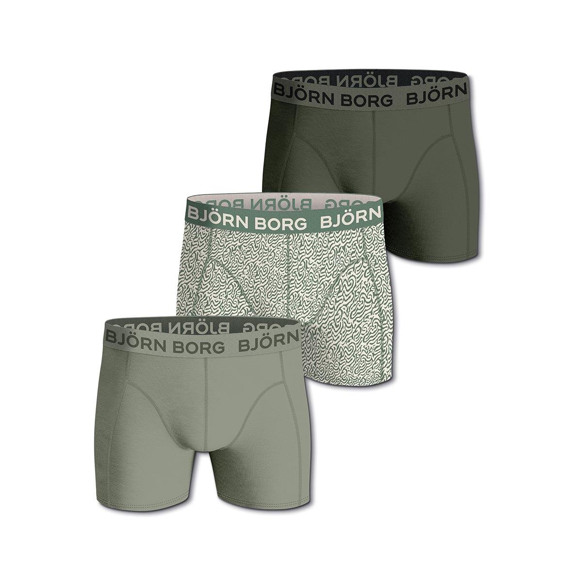 Tre par boxershorts i olika gröna nyanser med Björn Borg-logga på midjan