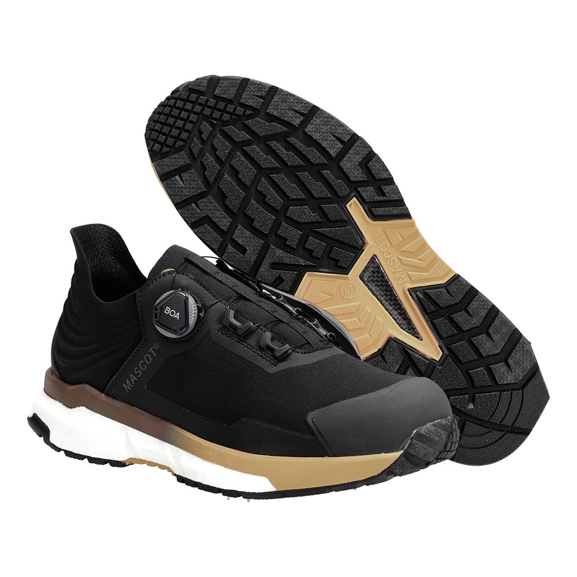 Svarta skyddsskor med vit och beige sula, robust design och slitstark yttersula för arbetsmiljö