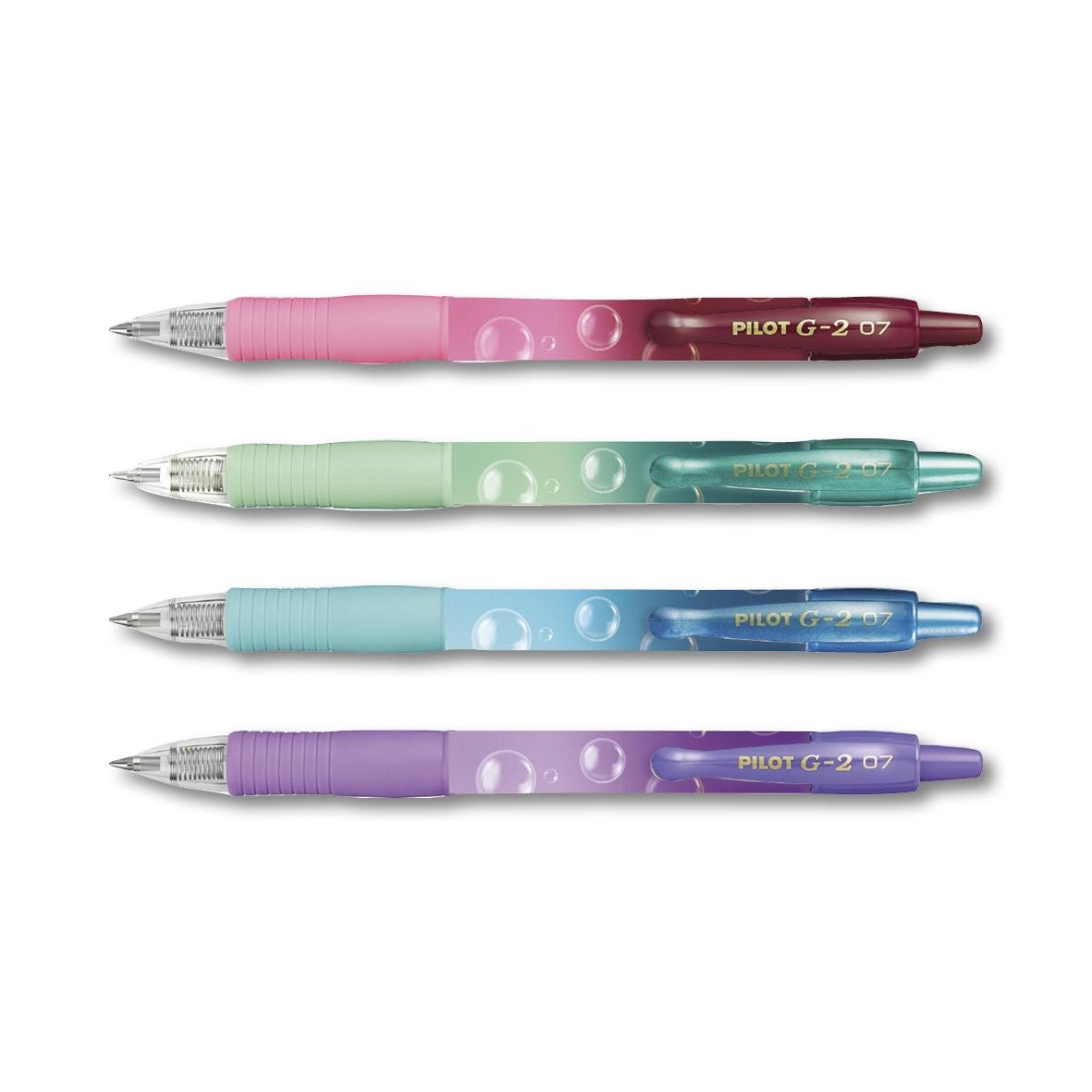 Set med fyra Pilot G2 Limited Edition gelpennor i rosa, grön, blå och lila med transparenta kroppar och guldfärgade textdetaljer