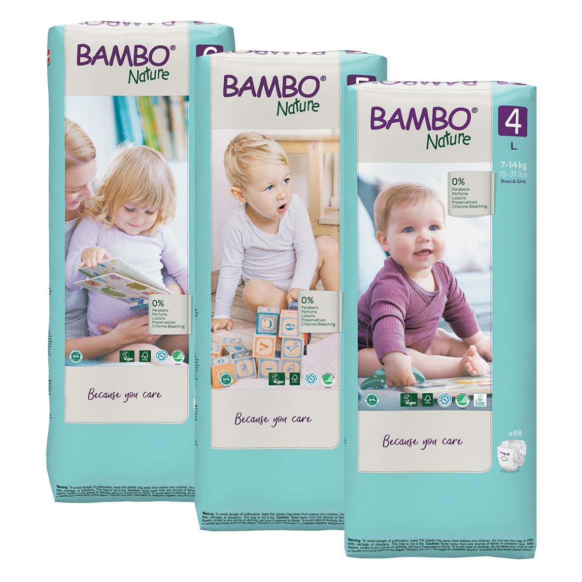 Tre paket Bambo Nature blöjor i storpack med bilder av glada barn på förpackningarna