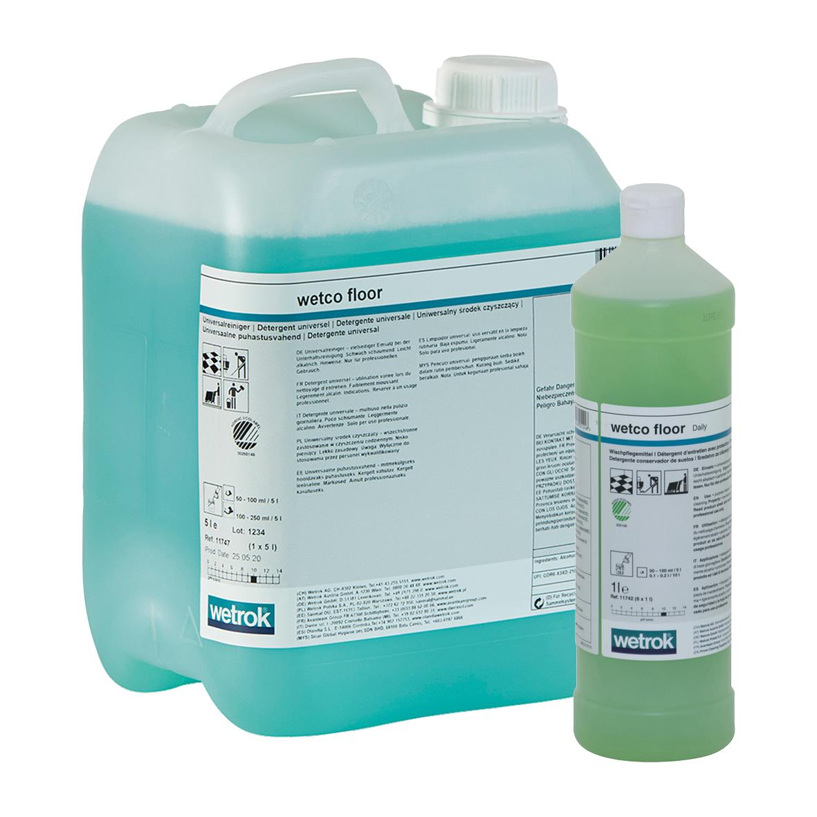 Två behållare med Wetrok Wetco Floor rengöringsmedel, en stor och en liten, i grönt och blått.