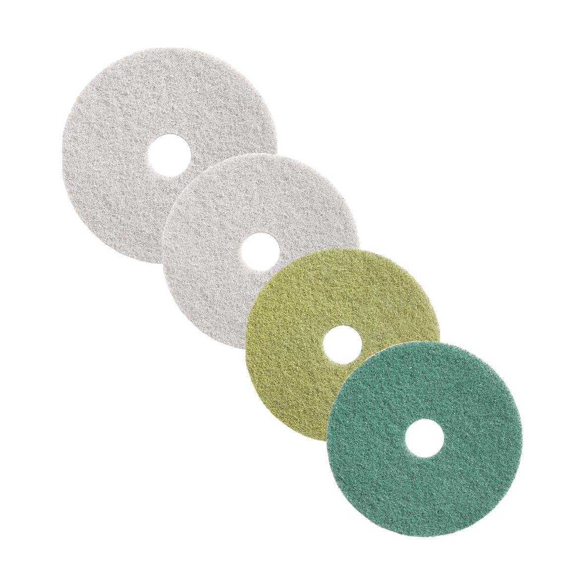 Fyra skivor av olika färger och storlekar för skurrondell diamantslipning