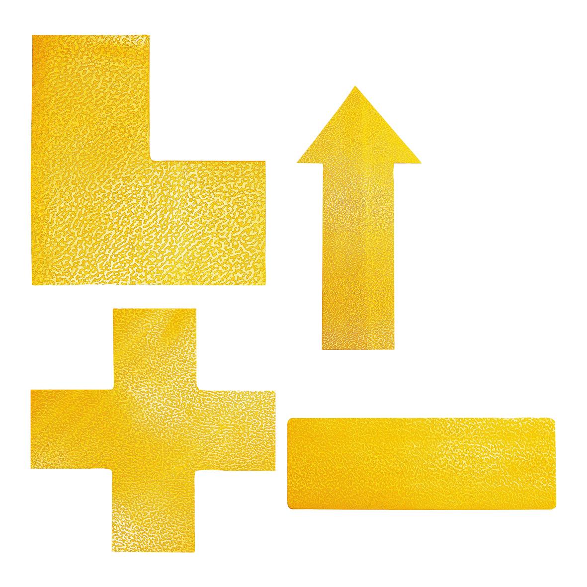 Guldfärgad golvmarkering i form av pilar och kors för tydlig vägledning