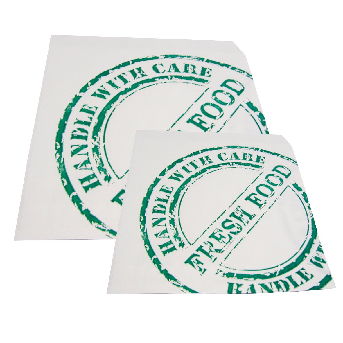 Två gröna tryckta hamburgerfickor med text och cirkelmönster