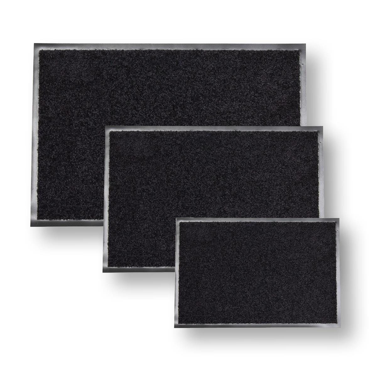 Tre svarta torkmattor i olika storlekar