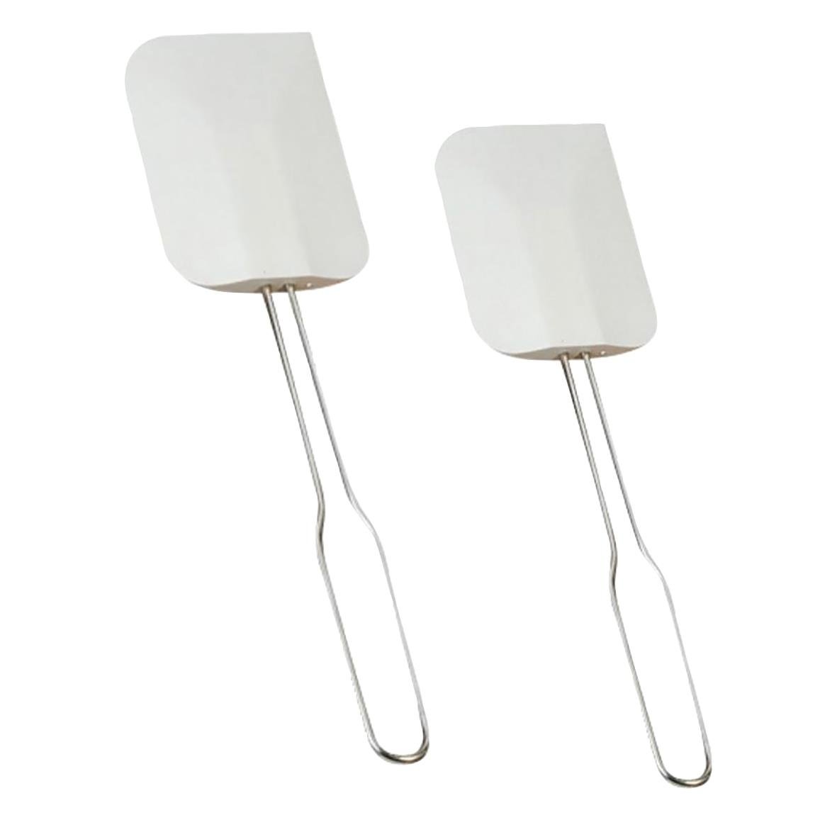 Två slickepottar med metallhandtag och vita spatlar